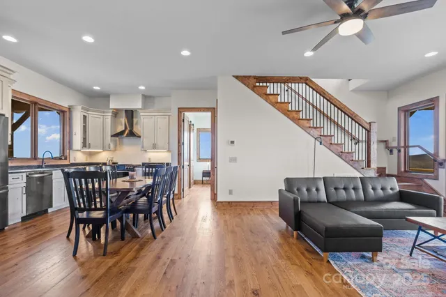a kitchen with granite countertop a stove top oven cabinetry and granite counter tops