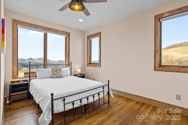 a view of balcony with furniture and wooden floor