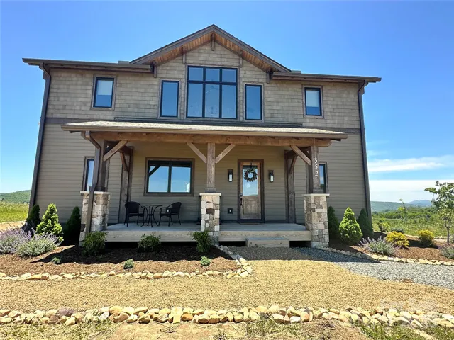 a living room with furniture tv and a flat screen tv