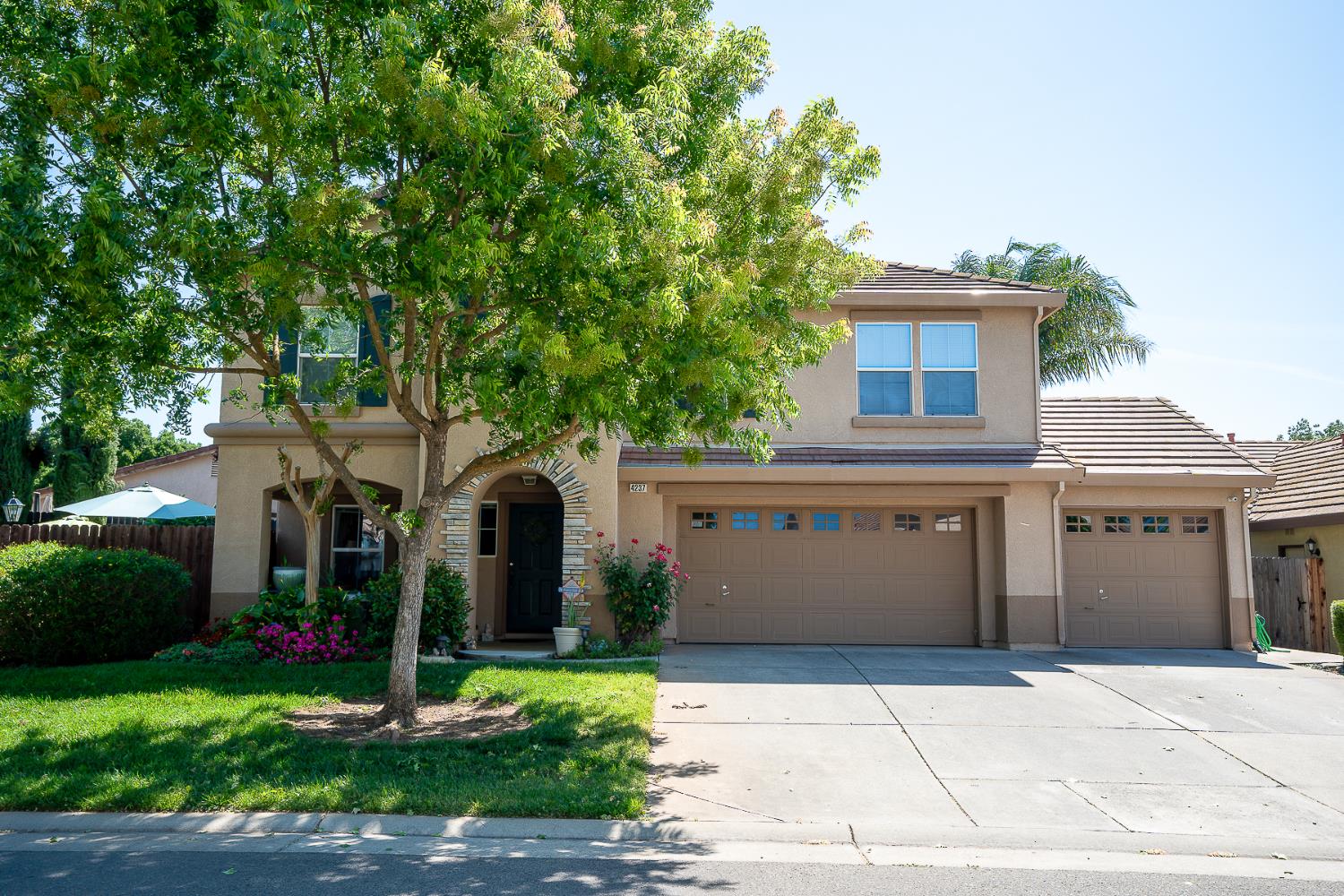 4237 Narraganset Way Mather, CA 95655 - Photo 1 of 40 a front view of a house with a yard