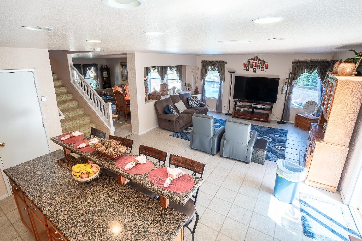 4237 Narraganset Way Mather, CA 95655 - Photo 11 of 40 a living room with furniture and flat screen tv