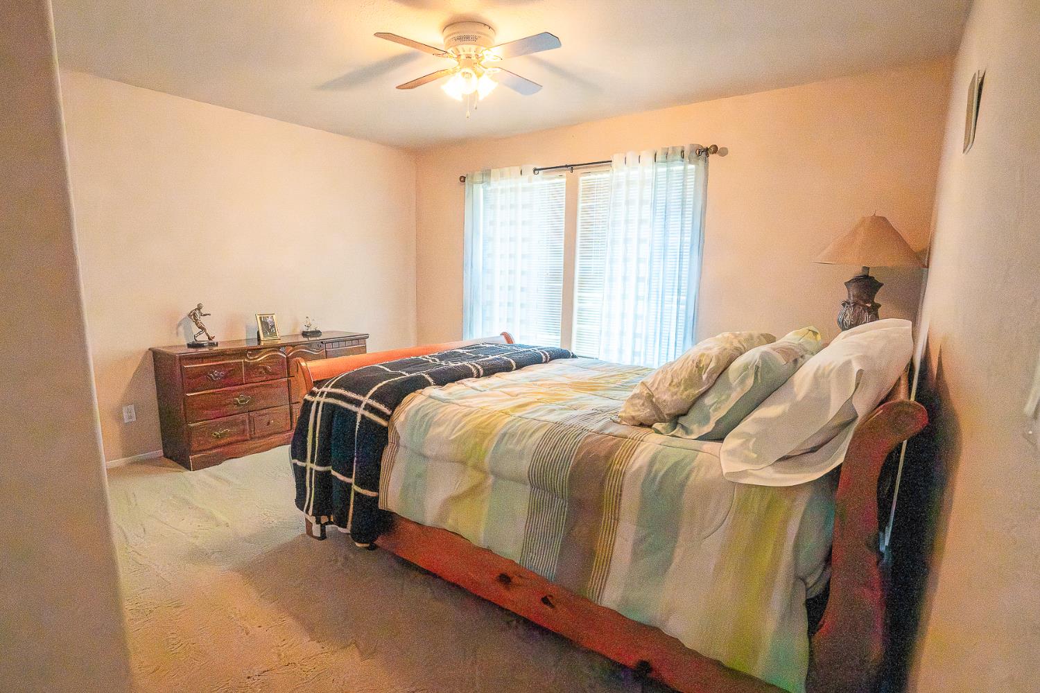 4237 Narraganset Way Mather, CA 95655 - Photo 27 of 40 a bedroom with a bed and a window