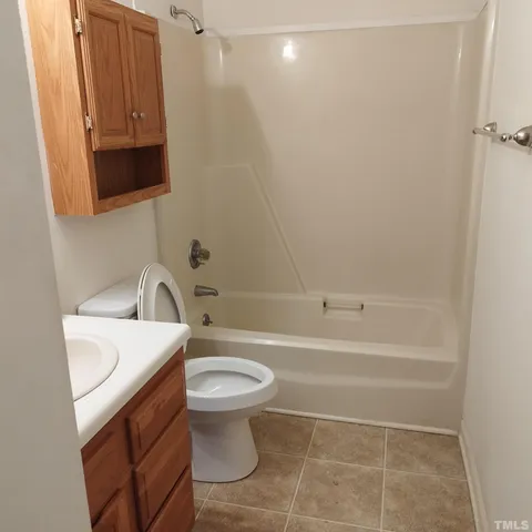a bathroom with a sink a toilet and a bathtub