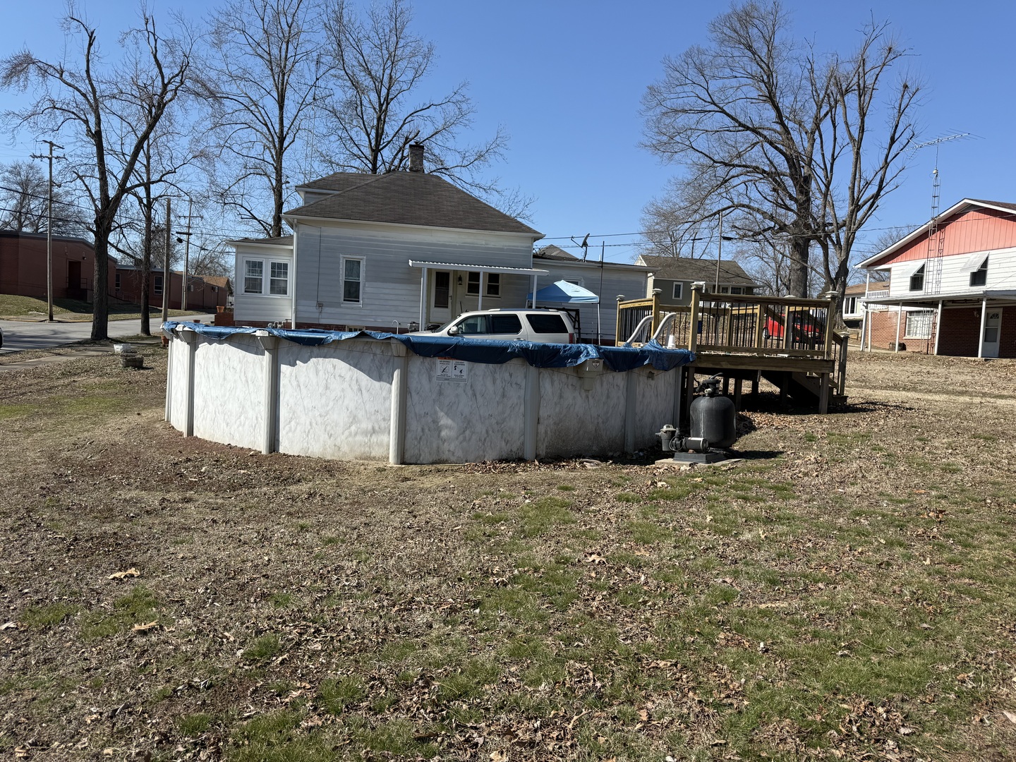 2000 1st Street Eldorado, IL 62930 - Photo 13 of 19 a front view of a house with a yard covered with snow