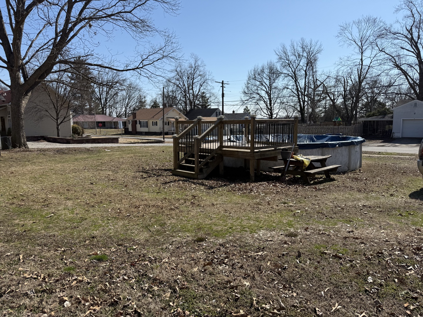 2000 1st Street Eldorado, IL 62930 - Photo 16 of 19 a car parked in front of a white house