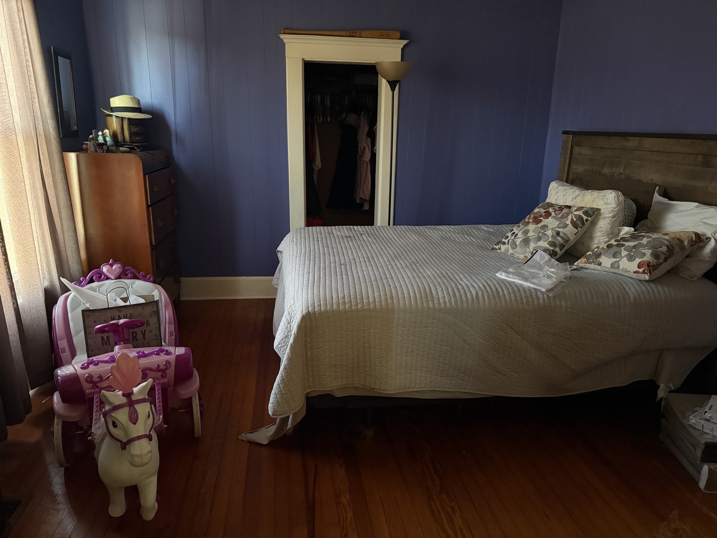 2000 1st Street Eldorado, IL 62930 - Photo 7 of 19 a bedroom with a bed and wooden floor