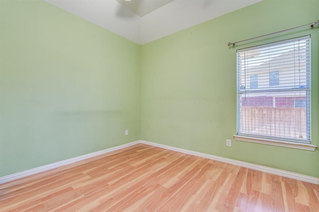 2300 Janna Way Carrollton, TX 75006 - Photo 13 of 40 a view of a room with wooden floor and a window
