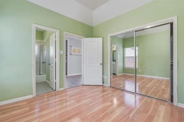 a bathroom with a shower and a sink