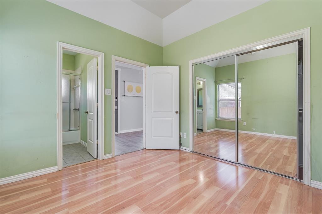 2300 Janna Way Carrollton, TX 75006 - Photo 14 of 40 a bathroom with a shower and a sink