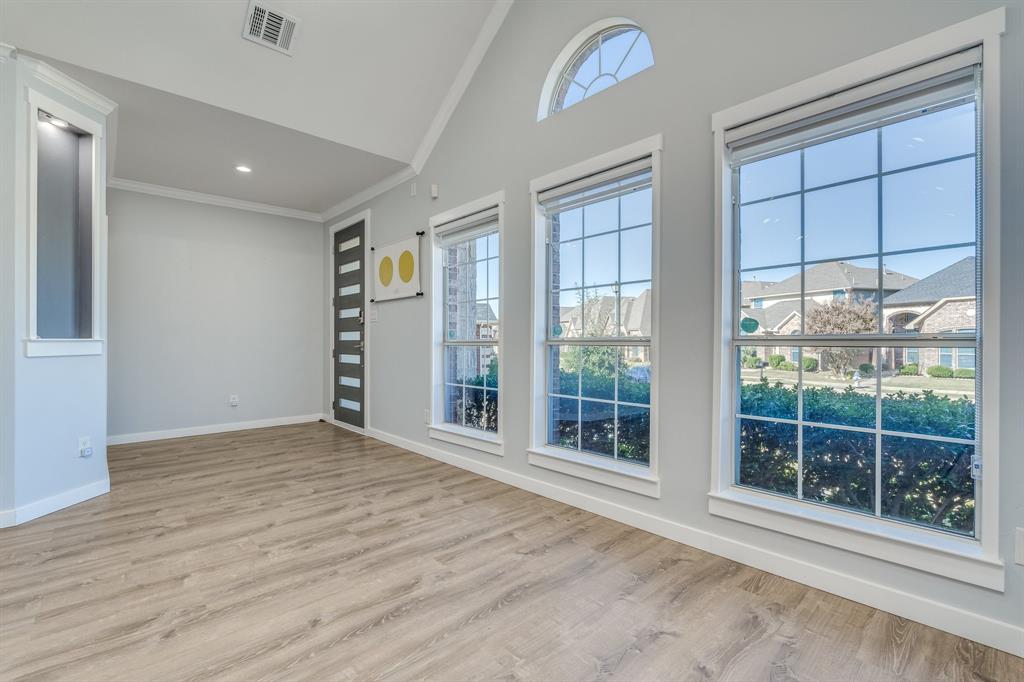 2300 Janna Way Carrollton, TX 75006 - Photo 7 of 40 a view of an empty room with a window