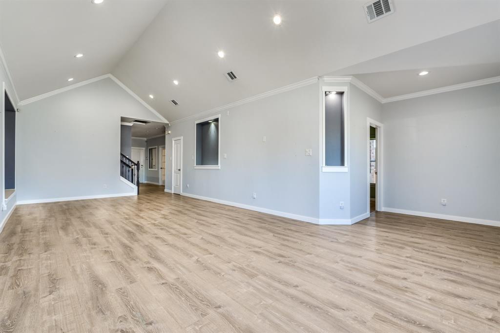 2300 Janna Way Carrollton, TX 75006 - Photo 8 of 40 a view of empty room with wooden floor