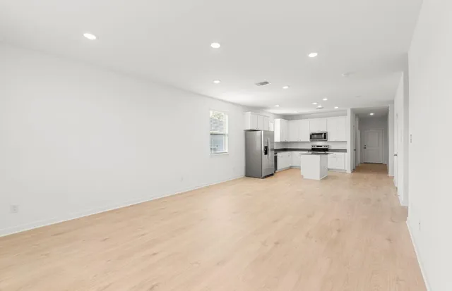 a bathroom with a sink toilet and mirror