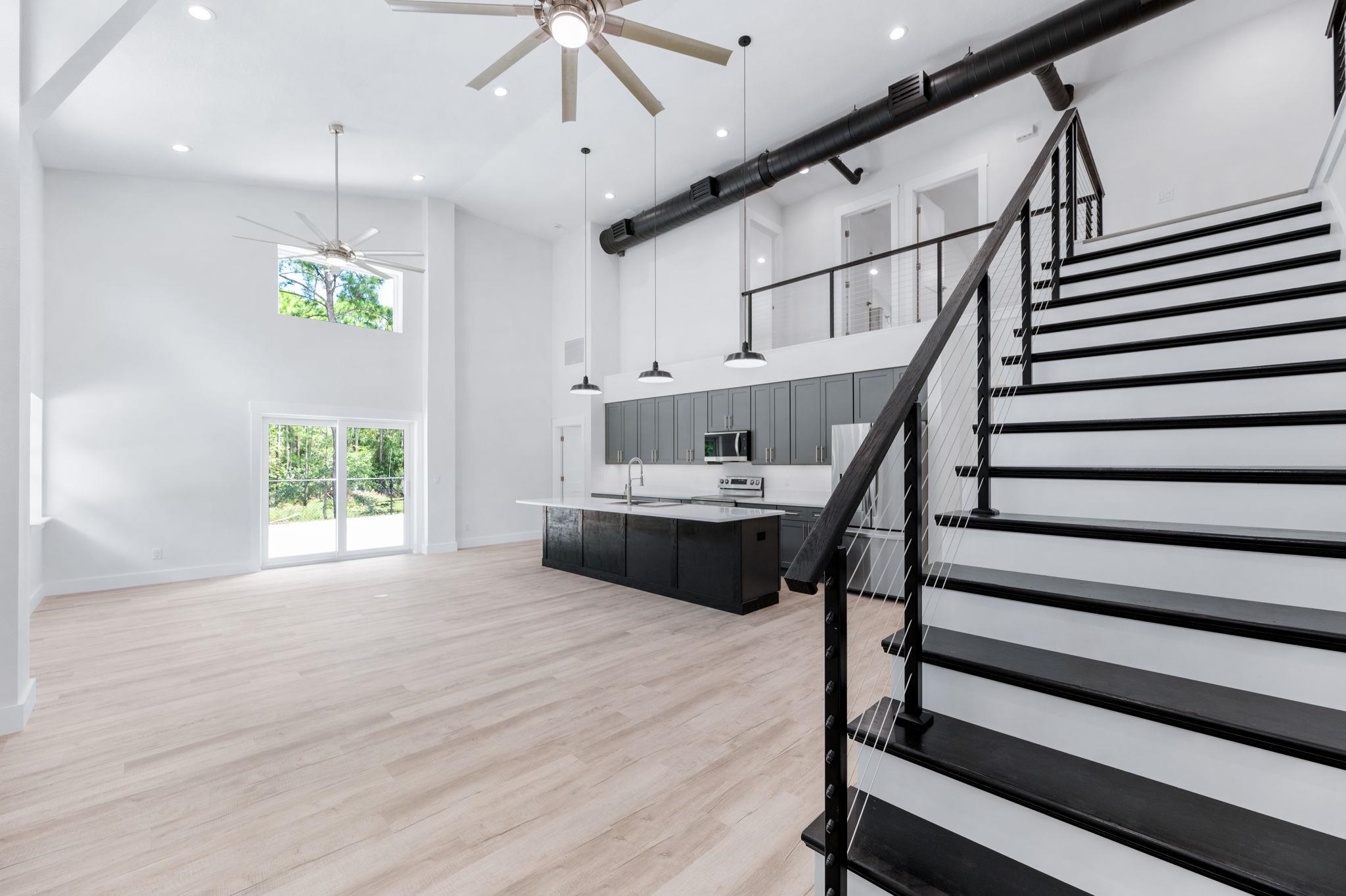 6132 Highway 1 St. Augustine, FL 32086 - Photo 24 of 55 a view of entryway and kitchen with wooden floor