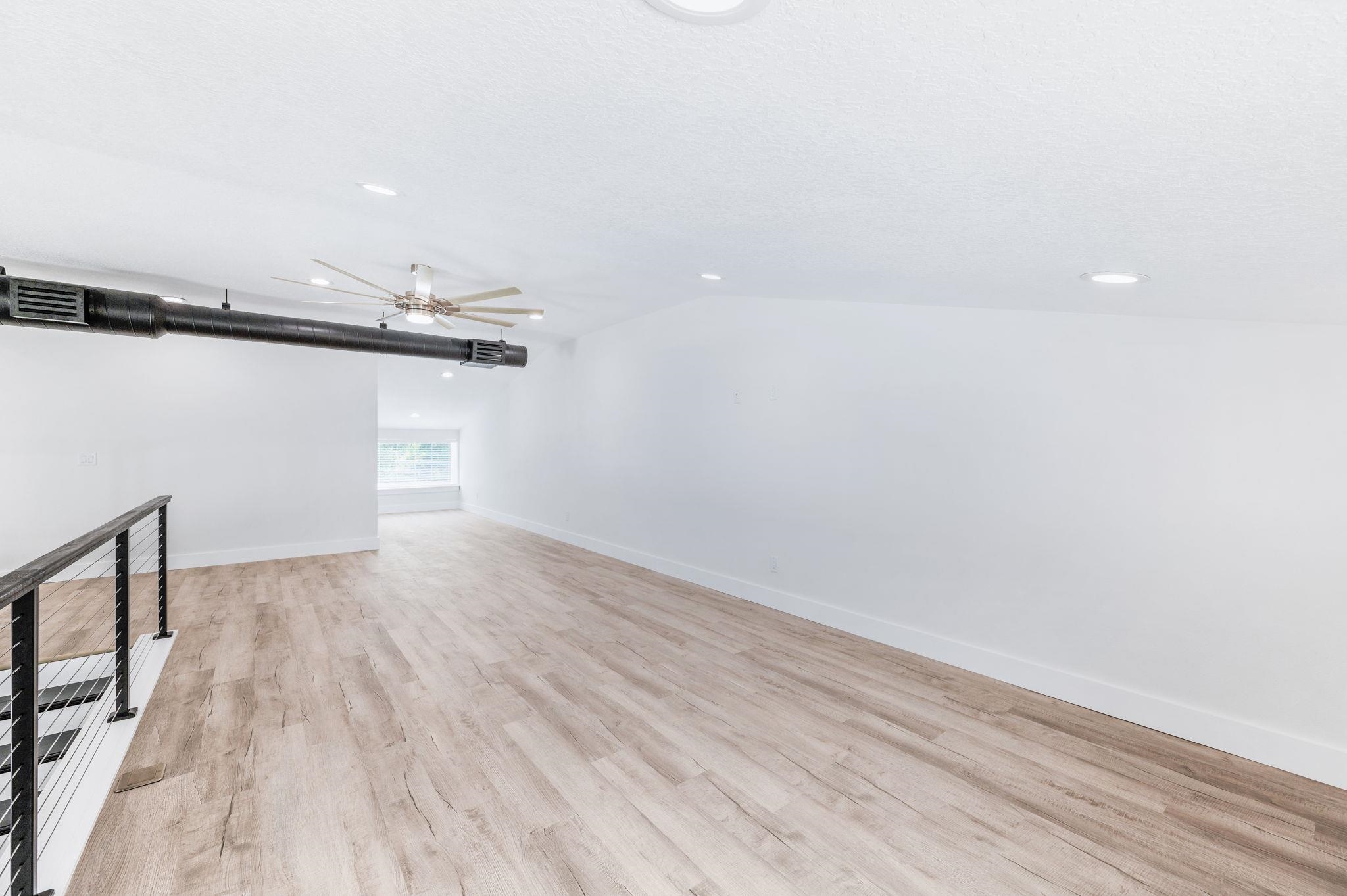 6132 Highway 1 St. Augustine, FL 32086 - Photo 28 of 55 a view of a room with wooden floor and white walls