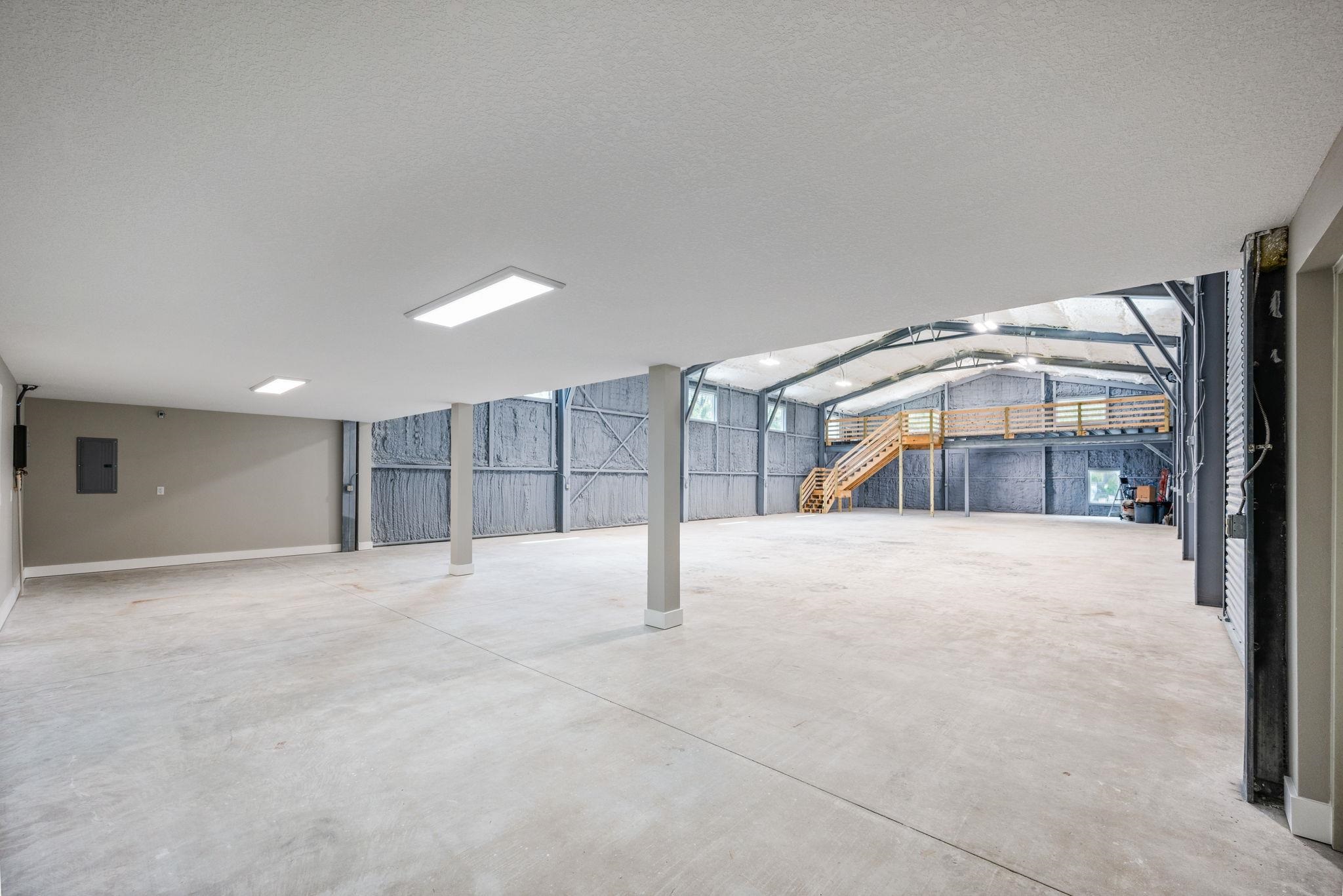 6132 Highway 1 St. Augustine, FL 32086 - Photo 40 of 55 a view of an empty room with a cabinet and mirrors