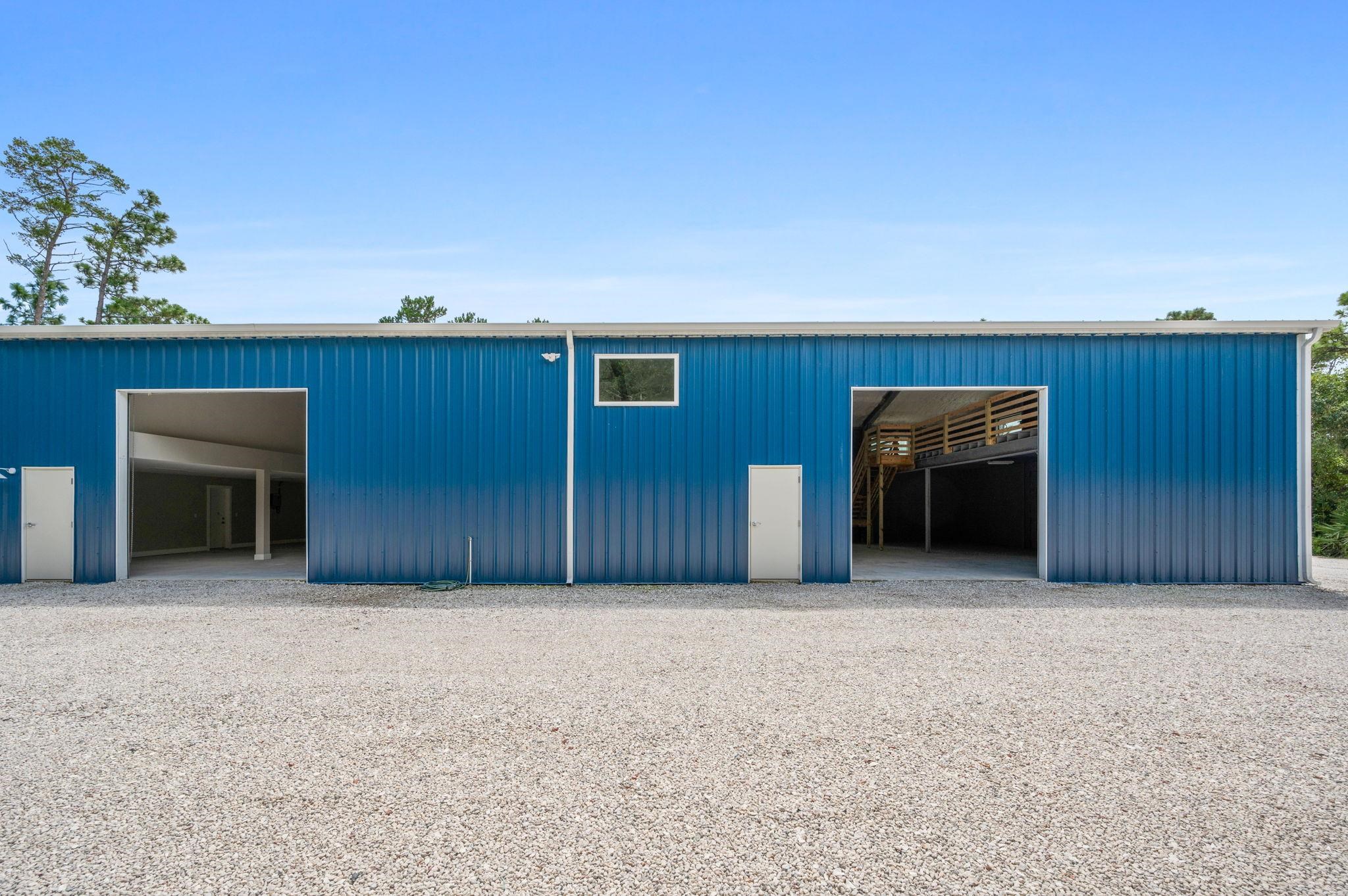 6132 Highway 1 St. Augustine, FL 32086 - Photo 49 of 55 an empty room with furniture and a kitchen