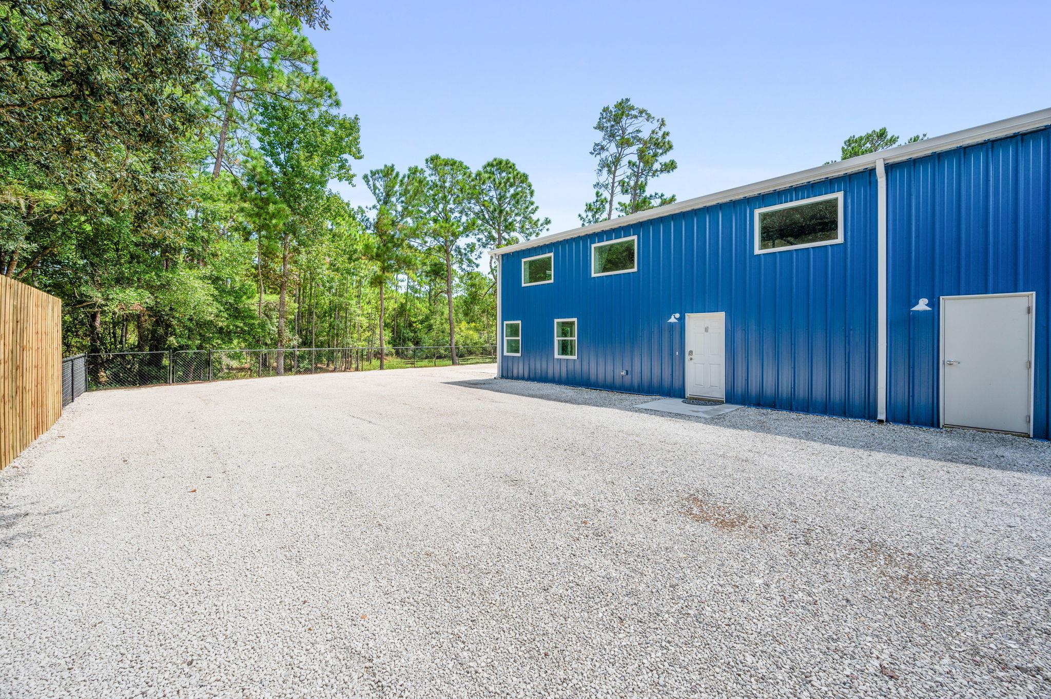 6132 Highway 1 St. Augustine, FL 32086 - Photo 5 of 55 a view of a house with a yard and garage
