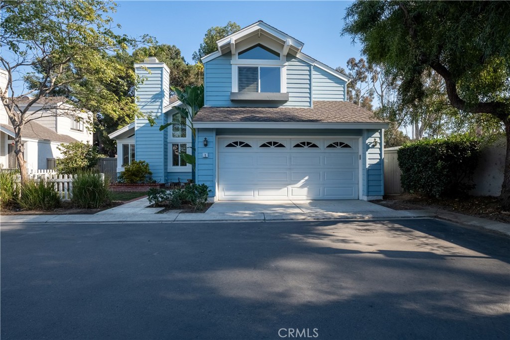 5 Wintermist, Unit 55 Irvine, CA 92614 - Photo 1 of 1 a view of front of a house with a yard
