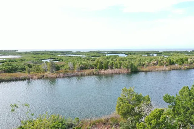 an aerial view of residential building and lake view