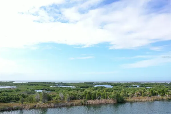 a view of lake and mountain