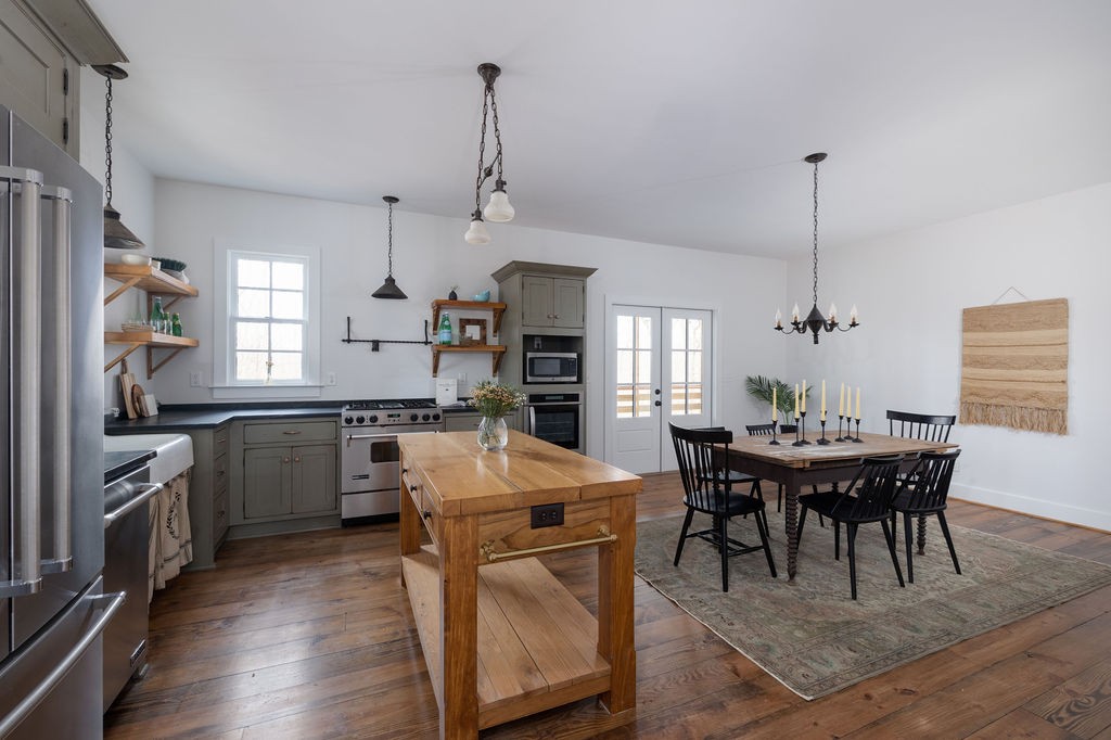 5184 Fire Tower Road Franklin, TN 37064 - Photo 13 of 70 a view of a dining room with furniture window and wooden floor
