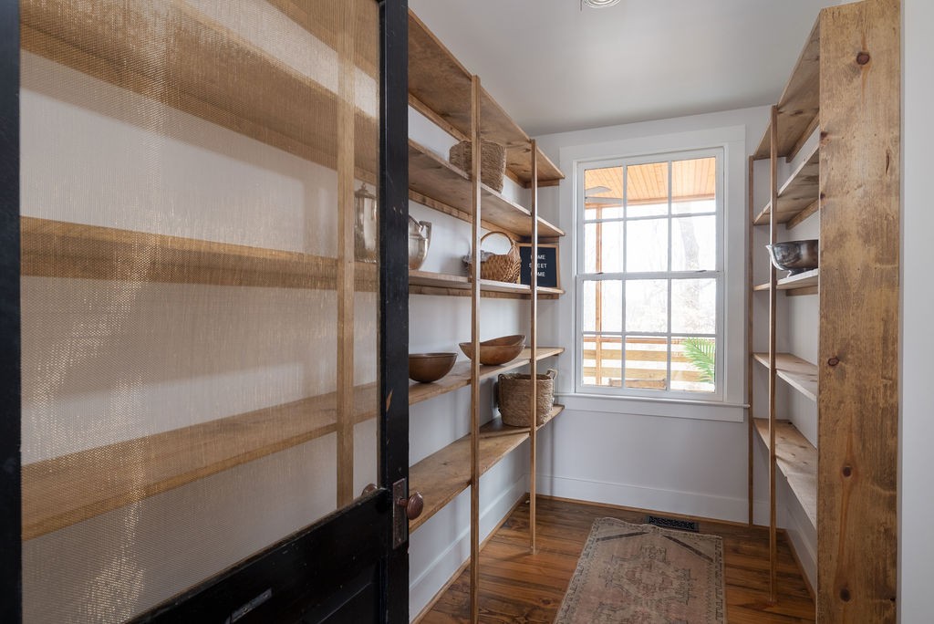 5184 Fire Tower Road Franklin, TN 37064 - Photo 21 of 70 a view of walk in closet with empty racks