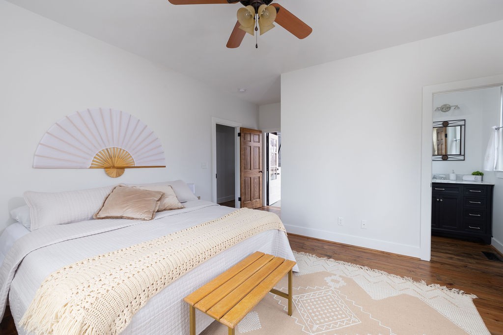 5184 Fire Tower Road Franklin, TN 37064 - Photo 27 of 70 a bedroom with a bed and wooden floor