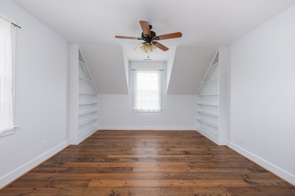5184 Fire Tower Road Franklin, TN 37064 - Photo 32 of 70 a view of empty room with wooden floor and fan