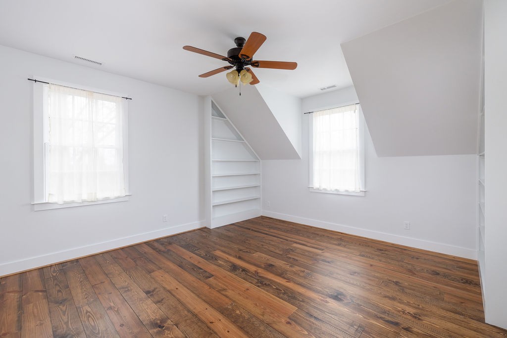 5184 Fire Tower Road Franklin, TN 37064 - Photo 33 of 70 a view of empty room with wooden floor and fan