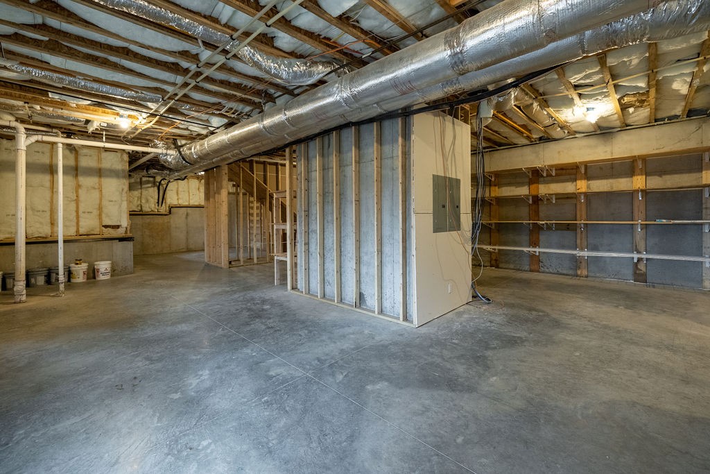 5184 Fire Tower Road Franklin, TN 37064 - Photo 47 of 70 a view of an empty room with wooden shelves