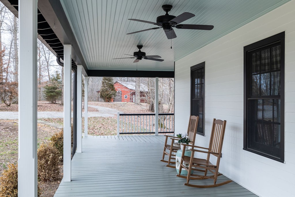 5184 Fire Tower Road Franklin, TN 37064 - Photo 65 of 70 a view of a dining room with furniture window and wooden floor