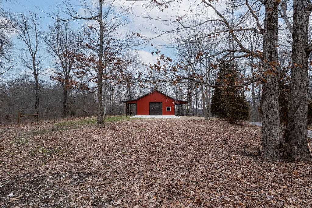 5184 Fire Tower Road Franklin, TN 37064 - Photo 70 of 70 a backyard of a house with lots of green space