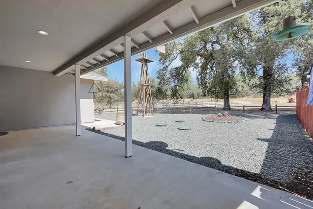 a view of kitchen with microwave and stove