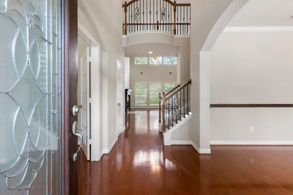 a view of entryway with wooden floor
