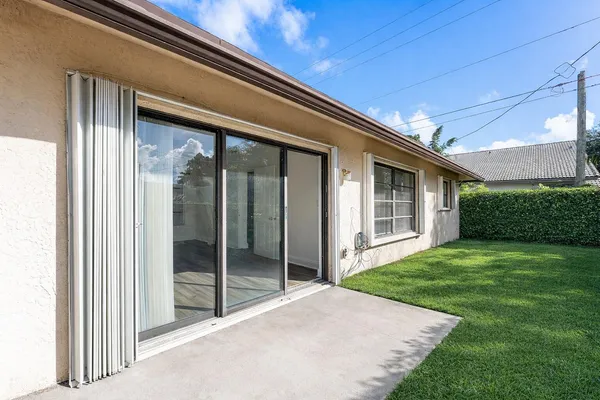 a view of a porch with a backyard