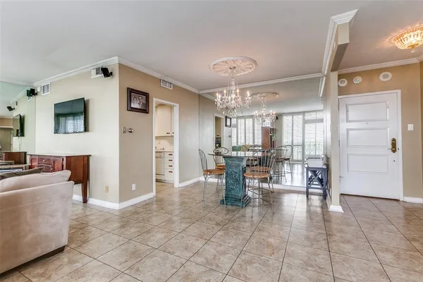 a view of a livingroom with furniture and a window
