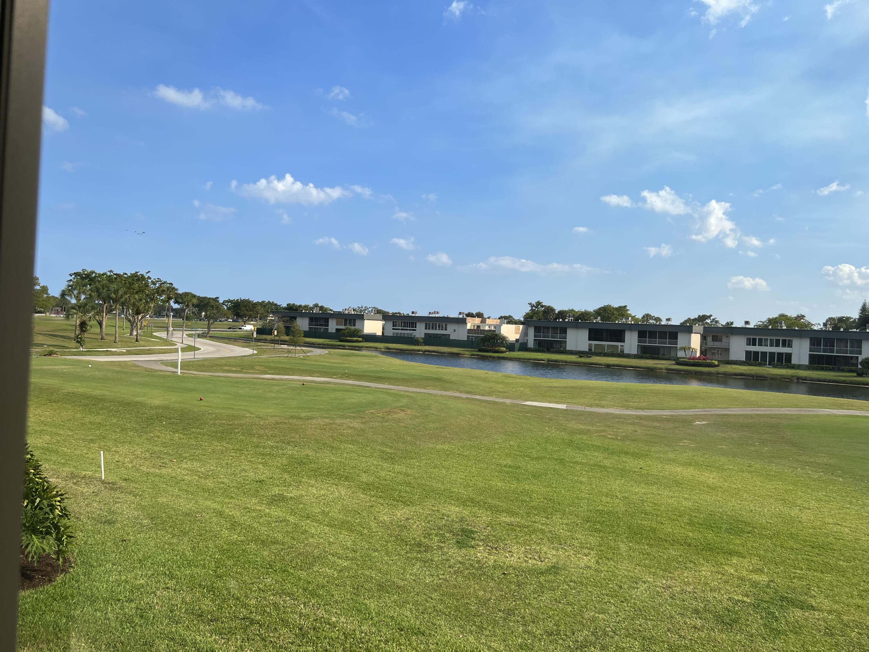 183 Normandy Lane Delray Beach, FL 33484 - Photo 19 of 80 a view of an ocean and a building