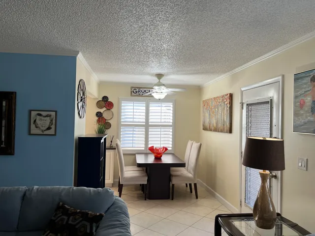 a bathroom with a sink vanity mirror and toilet
