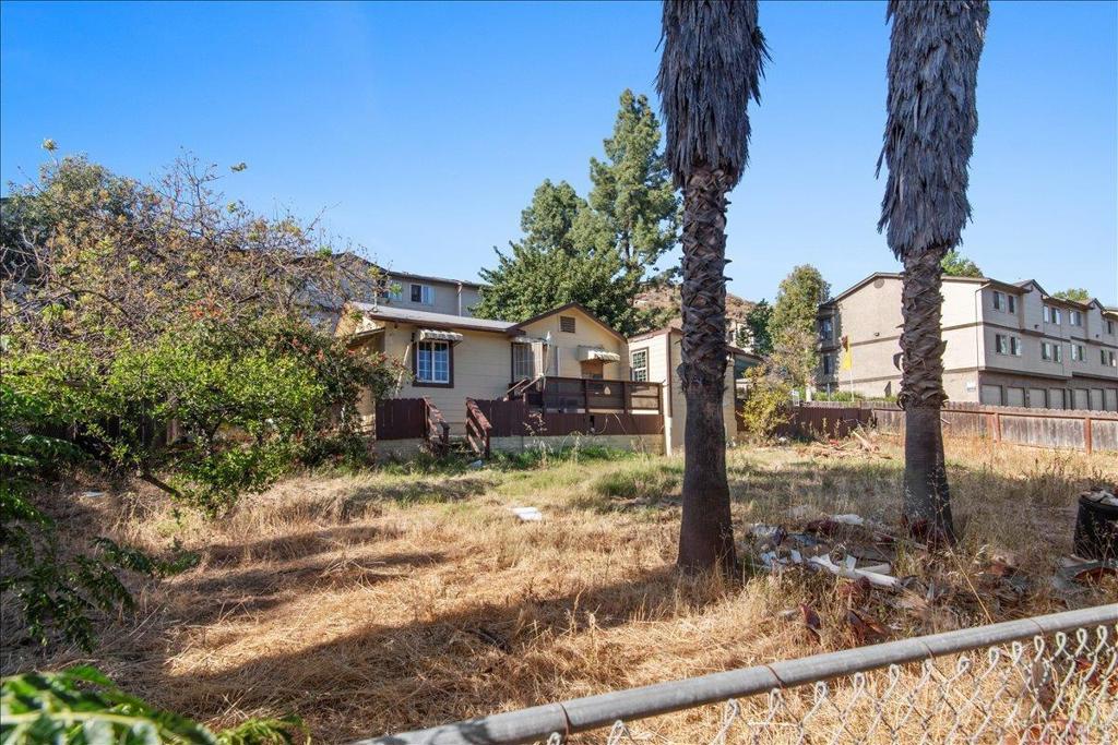 12828 Mapleview Street Lakeside, CA 92040 - Photo 22 of 36 a view of a house with a tree in the background