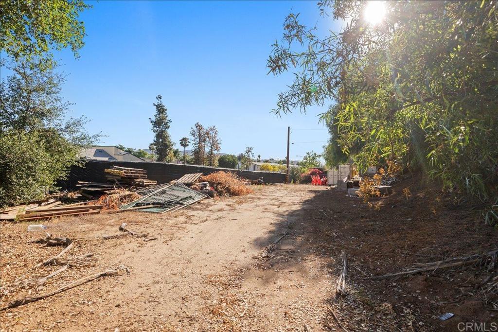 12828 Mapleview Street Lakeside, CA 92040 - Photo 26 of 36 a view of a road with a bench in the background