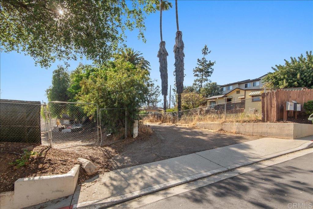 12828 Mapleview Street Lakeside, CA 92040 - Photo 3 of 36 a front view of a house with a yard