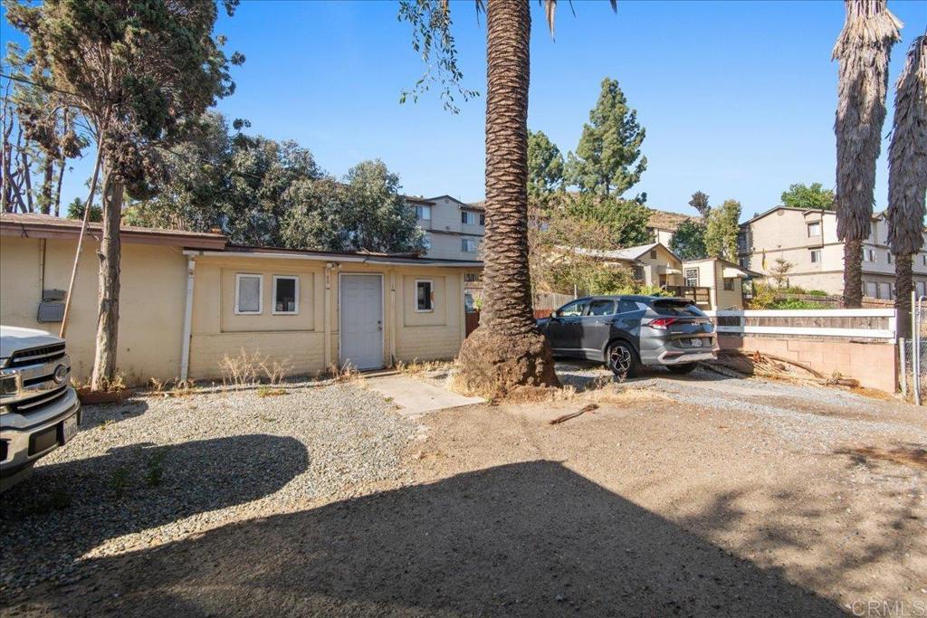 12828 Mapleview Street Lakeside, CA 92040 - Photo 4 of 36 a backyard of a house with barbeque oven and outdoor seating