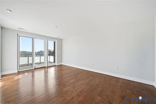 a bathroom with a granite countertop sink mirror and