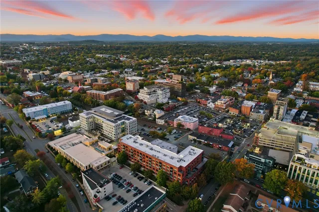 a view of city and mountain from a balcony