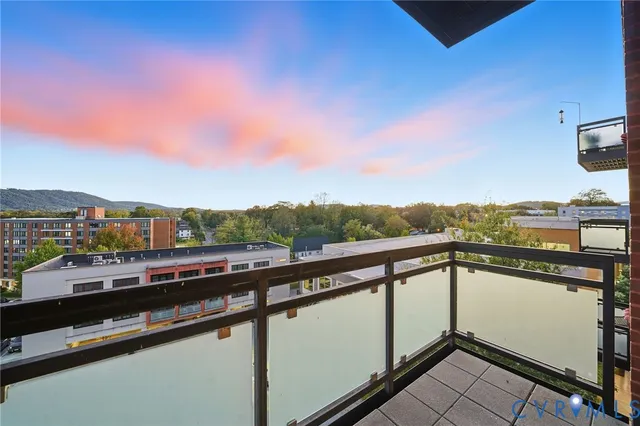 a brick building with a outdoor seating