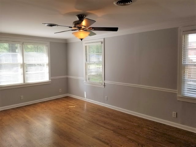 1210 Dearing Road Memphis, TN 38117 - Photo 6 of 25 The oversized den can be used solely as a den area or as a den/dining room combo. This room also features solid oak hardwoods, fresh paint, and is surrounded by windows.