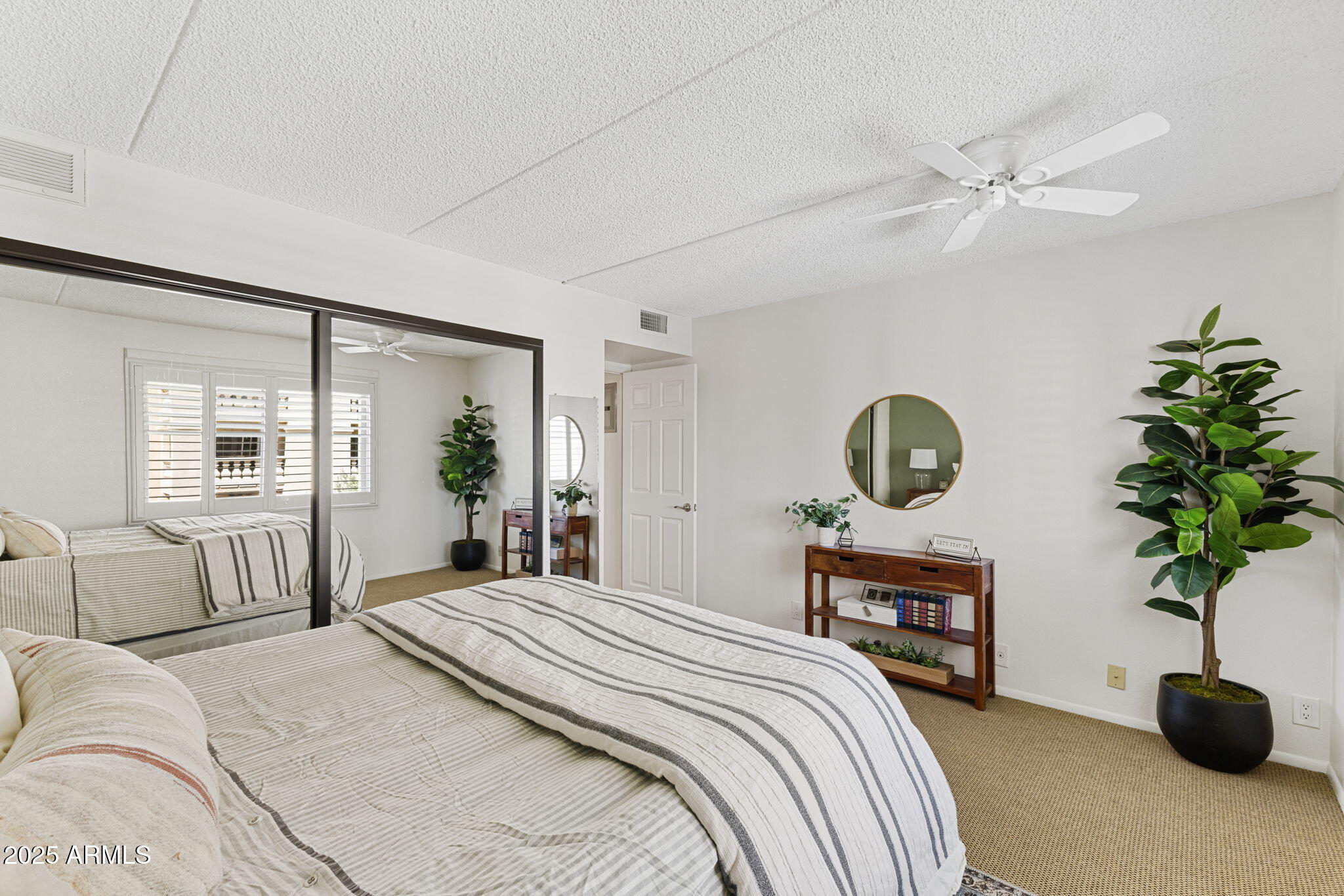 7930 East Camelback Road, Unit 409 Scottsdale, AZ 85251 - Photo 15 of 36 Spacious Primary Bedroom