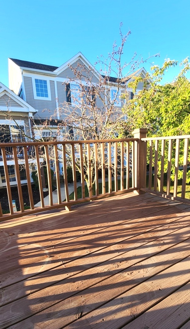 117 Enclave Circle, Unit A Bolingbrook, IL 60440 - Photo 8 of 18 a view of a brick house with a ocean view