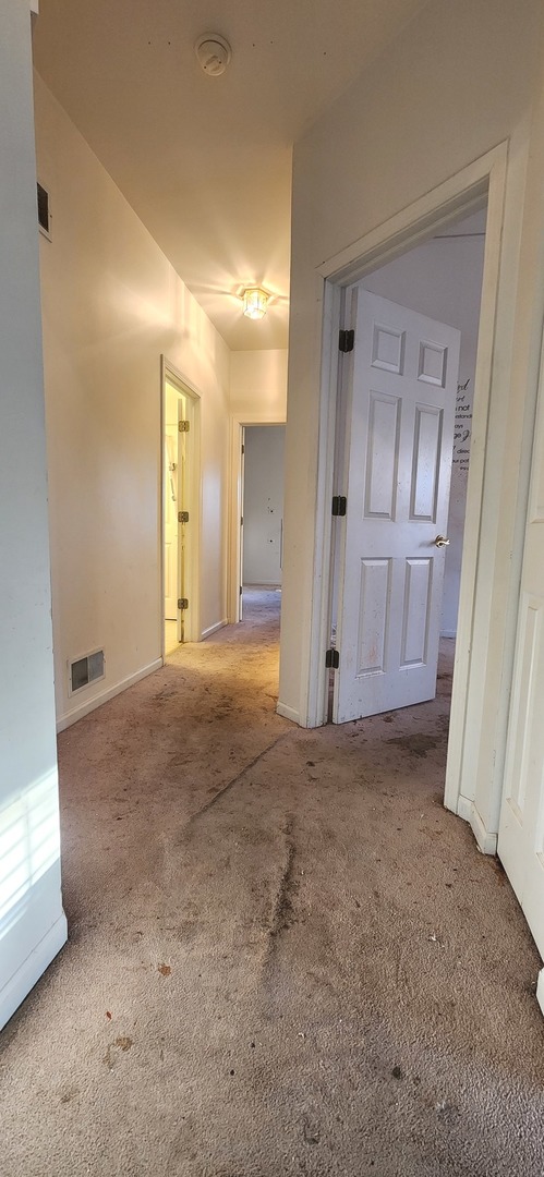 117 Enclave Circle, Unit A Bolingbrook, IL 60440 - Photo 9 of 18 a view of an empty room