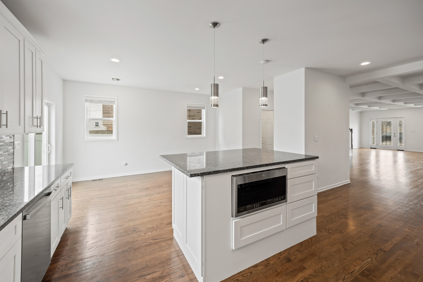 1823 35th Avenue Stone Park, IL 60165 - Photo 13 of 44 a view of kitchen with sink and microwave